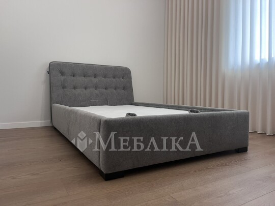 Ліжко в тканині з підйомним механізмом та узголів'ям під нахилом  L-029