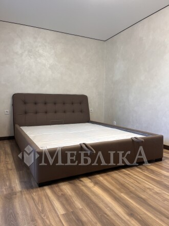 Ліжко в тканині з підйомним механізмом та узголів'ям під нахилом  L-029