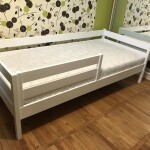 Букове дитяче ліжко Нота з захистом від стіни